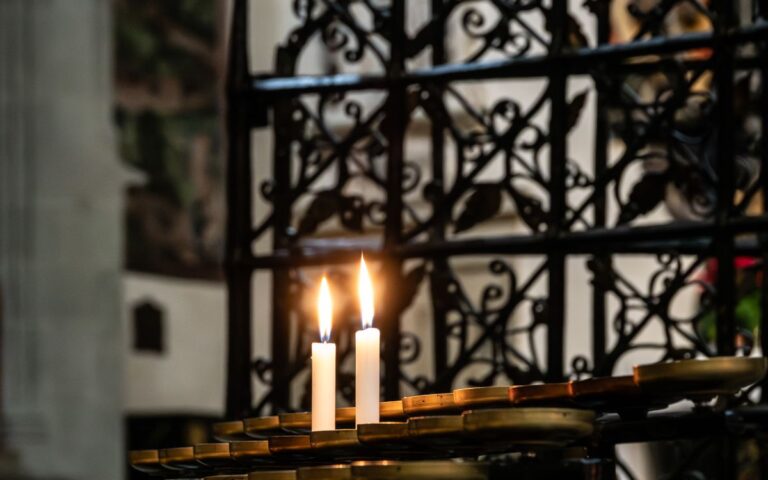 Serene view of candles on a church altar in Konstanz, Germany.