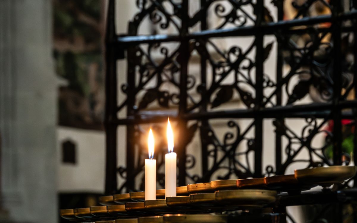 Serene view of candles on a church altar in Konstanz, Germany.
